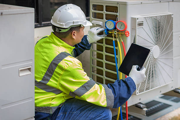 Professional Air Conditioning Repair technician working in Cassopolis, MI